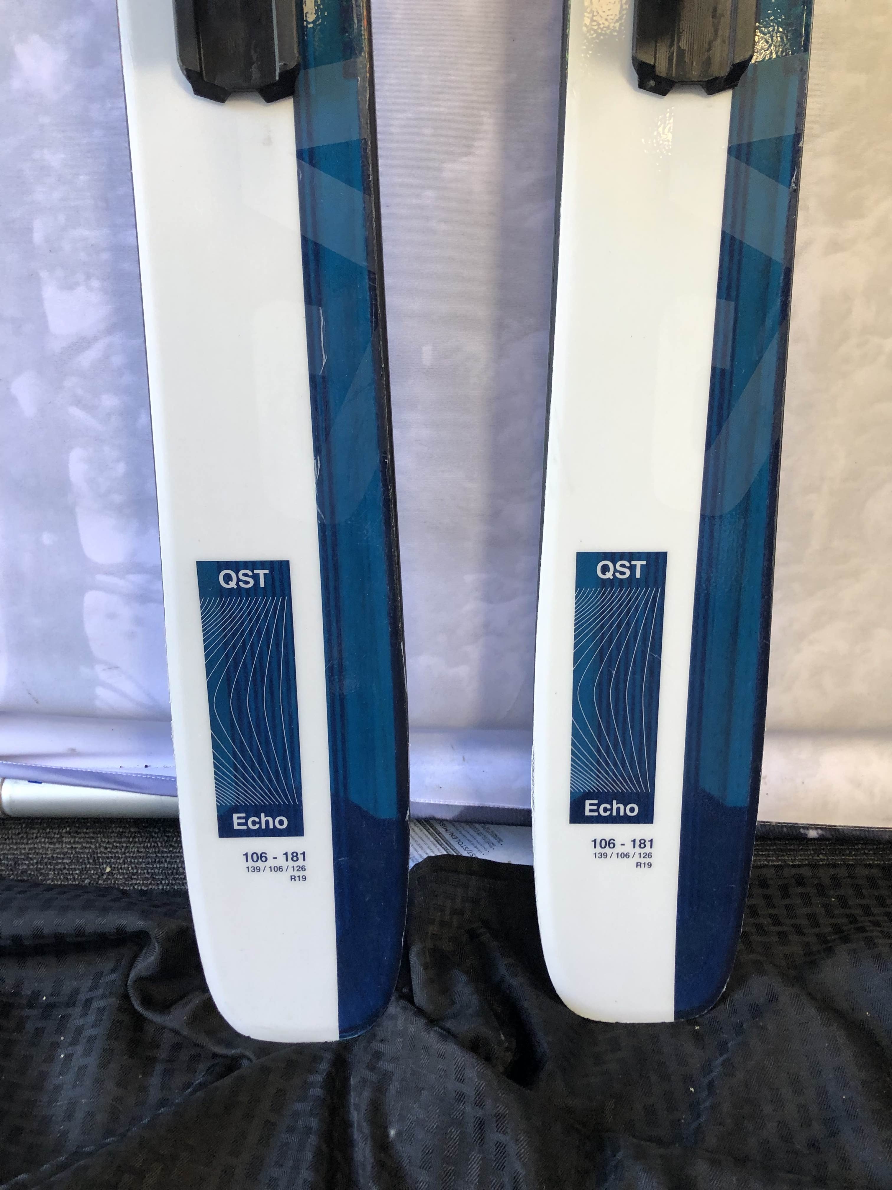 Used Salomon QST Echo 106 Skis - 181cm w/ Salomon Strive 13 Demo Binding