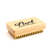The topside of the Purl Brass Wax Brush for Ski & Snowboard Tuning