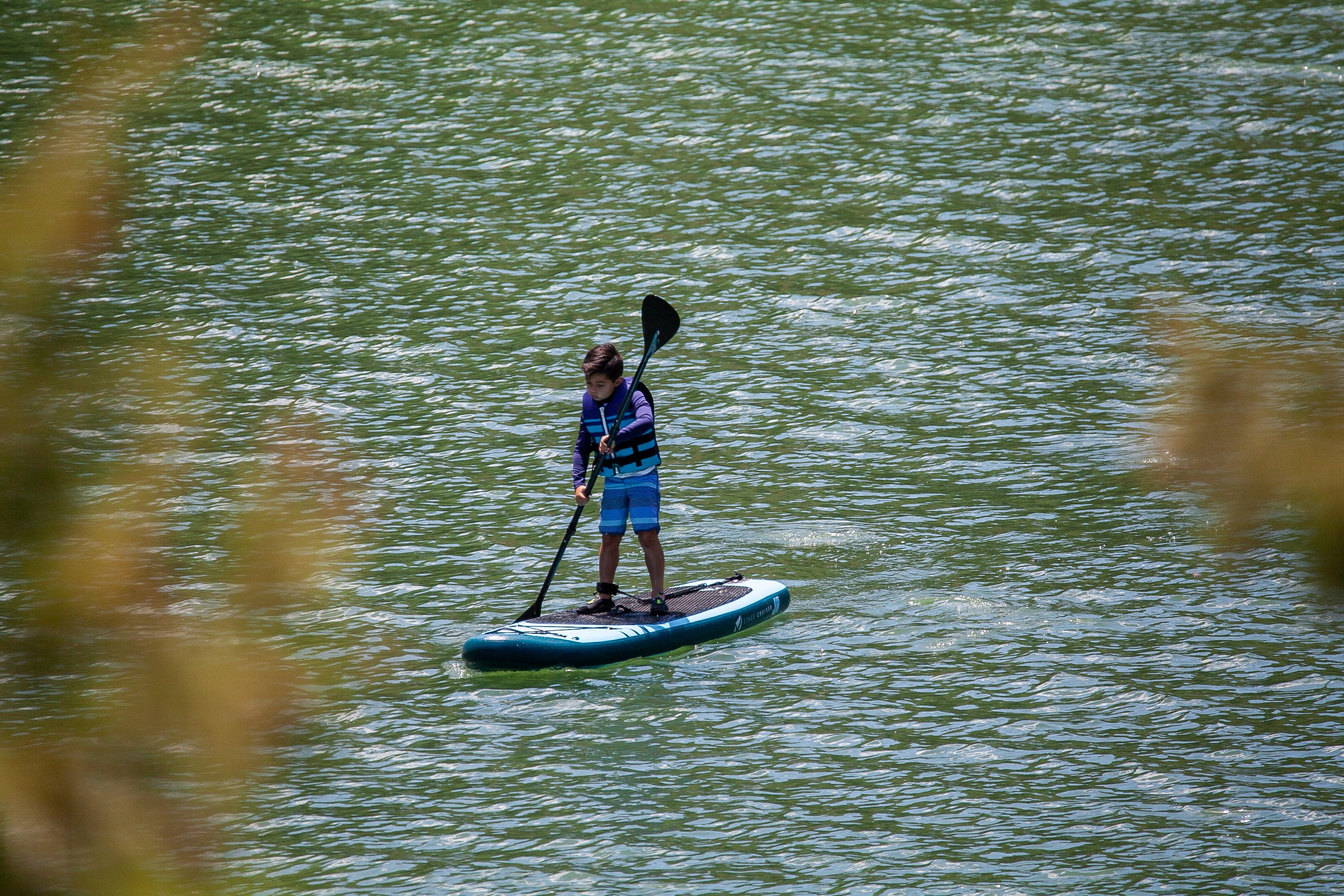 The J8 Junior Cruiser is the perfect SUP board the little adventurers! The smaller dimensions offer a more manageable and lightweight design to make sure your little ones are safe and having fun on the water. The J8 Cruiser is made with super durable and long lasting military grade 2-ply PVC, as well as drop stitch technology which makes an inflatable just as rigid and stable as a hard board.