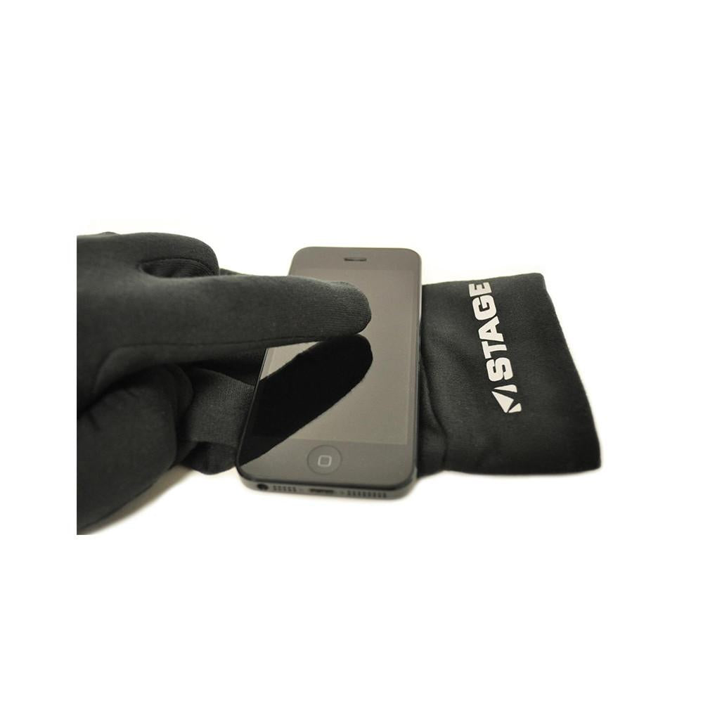 Easily operate your touch screen with gloves on! The Stage touch gloves have conductive material on the thumb and pointer finger that allow you to operate any touch screen. Keep your fingers warm while texting at the bus stop, using the ATM, or checking email on the ski lift. These thin gloves are great as a base layer, or wear them alone. The soft micro fleece offers a comfortable, customized fit. The Stage reflective logo offers visibility after dark. Available in size small, medium, large, x-large